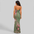 Back view of green floral maxi dress with spaghetti straps and bodycon fit by BELLA HUDSON