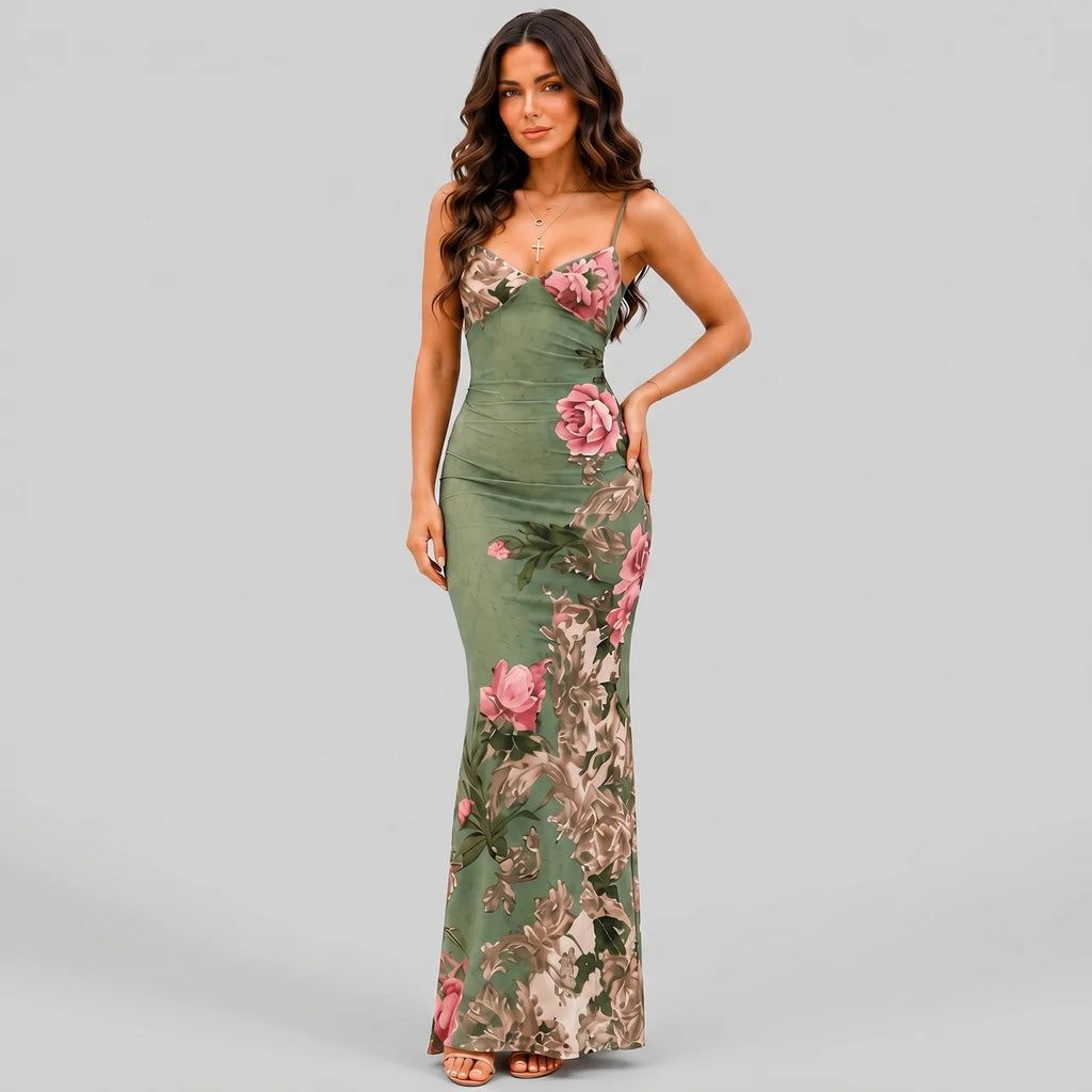 Side view of green floral maxi dress with spaghetti straps and bodycon fit by BELLA HUDSON
