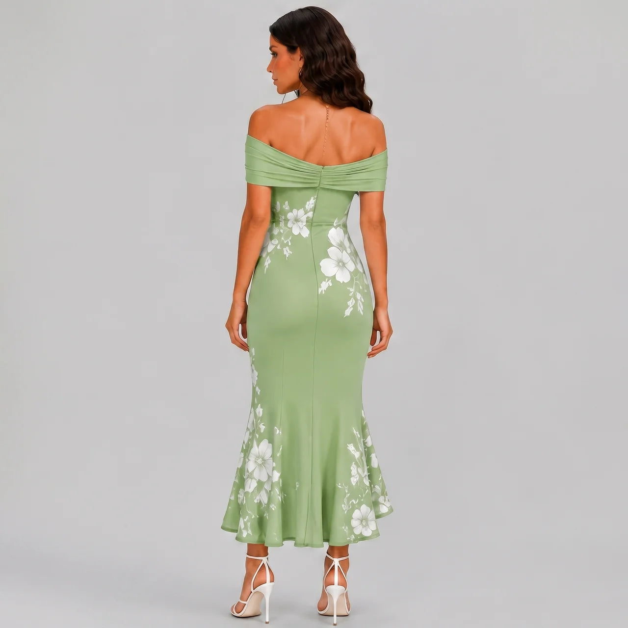 Back view of green floral off shoulder maxi dress with fitted silhouette by BELLA HUDSON