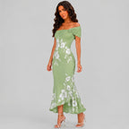 Side view of green floral off shoulder maxi dress with fitted silhouette by BELLA HUDSON