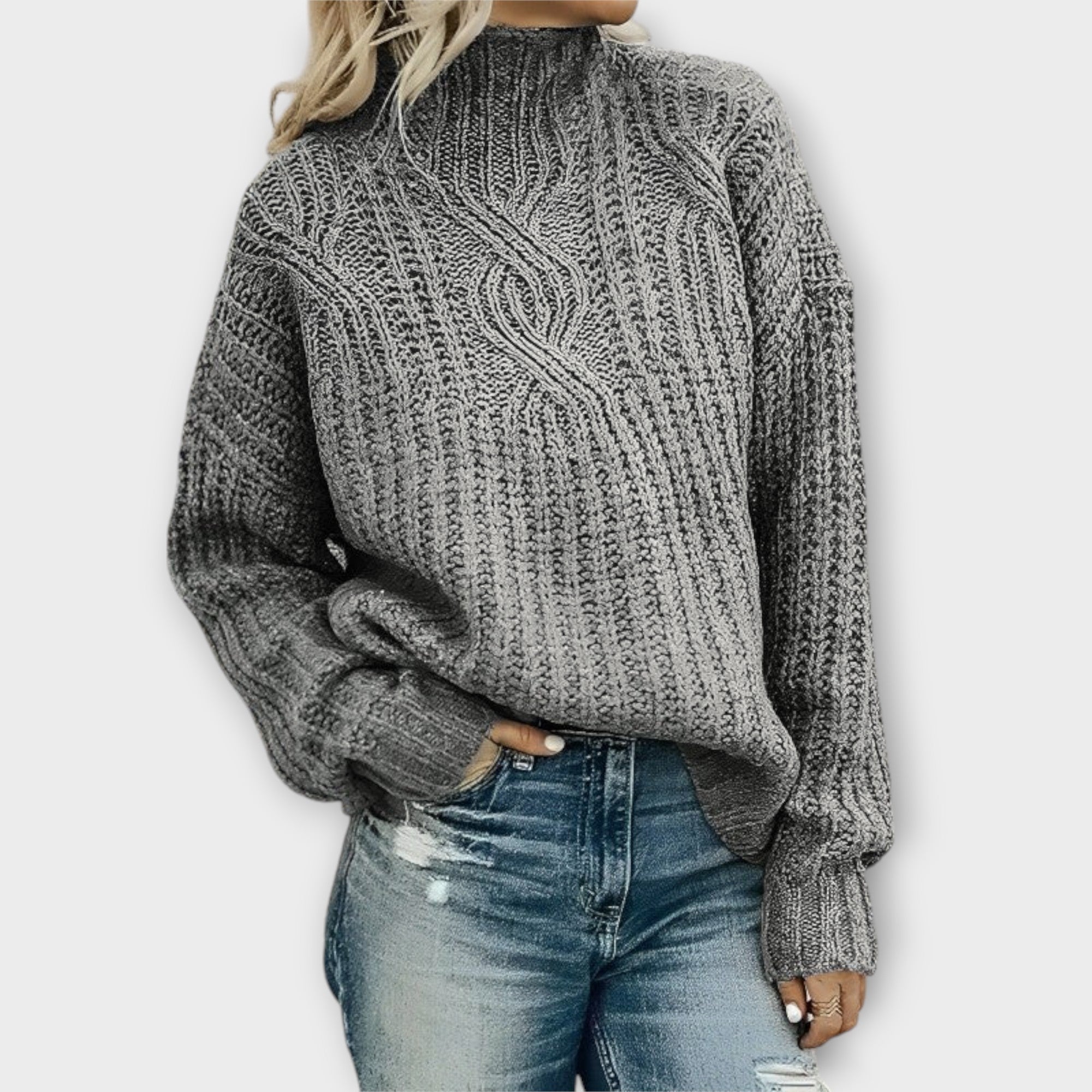Front view of the Halvard Sweater Cable-Knit Turtleneck in gray, featuring a high turtleneck, textured cable-knit pattern, long sleeves, and a relaxed silhouette. Designed by Bella Hudson.