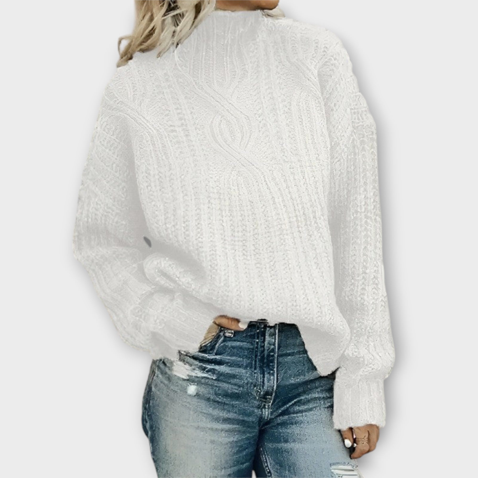 Front view of the Halvard Sweater Cable-Knit Turtleneck in white, featuring a high turtleneck, textured cable-knit pattern, long sleeves, and a cozy relaxed fit. Designed by Bella Hudson.