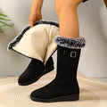 Hazel Black faux suede mid-calf winter boots with faux fur trim, buckle strap, rounded toe, and low-profile sole