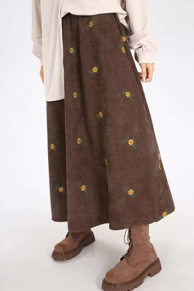 Hazel Khaki floral embroidered corduroy midi skirt styled in a full-length look