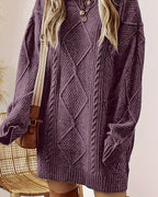 Helene Purple cable-textured sweater dress with a round neckline, long sleeves, geometric knit detailing, and relaxed above-the-knee silhouette