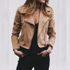 Front view of the Ingeborg Jacket Suede Cropped in brown, featuring a wide lapel collar, asymmetric zip-front closure, long sleeves, and a soft suede finish. Designed by Bella Hudson.