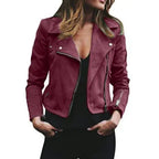 Front view of the Ingeborg Jacket Suede Cropped in red, featuring a wide lapel collar, asymmetric zipper, long sleeves, and a fitted cropped silhouette. Designed by Bella Hudson.