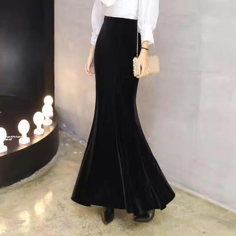 Isla Black corduroy maxi skirt with high waist and dramatic flared hem
