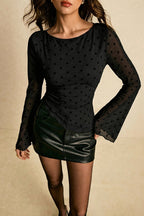 Isla Black Polka Dot mesh top showing the fitted silhouette, round neckline and flared sleeves.