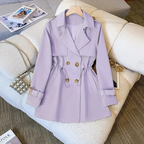 Product view of the Jennifer Trench Coat Belted Double-Breasted in purple, featuring a notched lapel collar, double-breasted button front, long sleeves with buckle cuffs, belted waist, and flared silhouette. Designed by Bella Hudson.