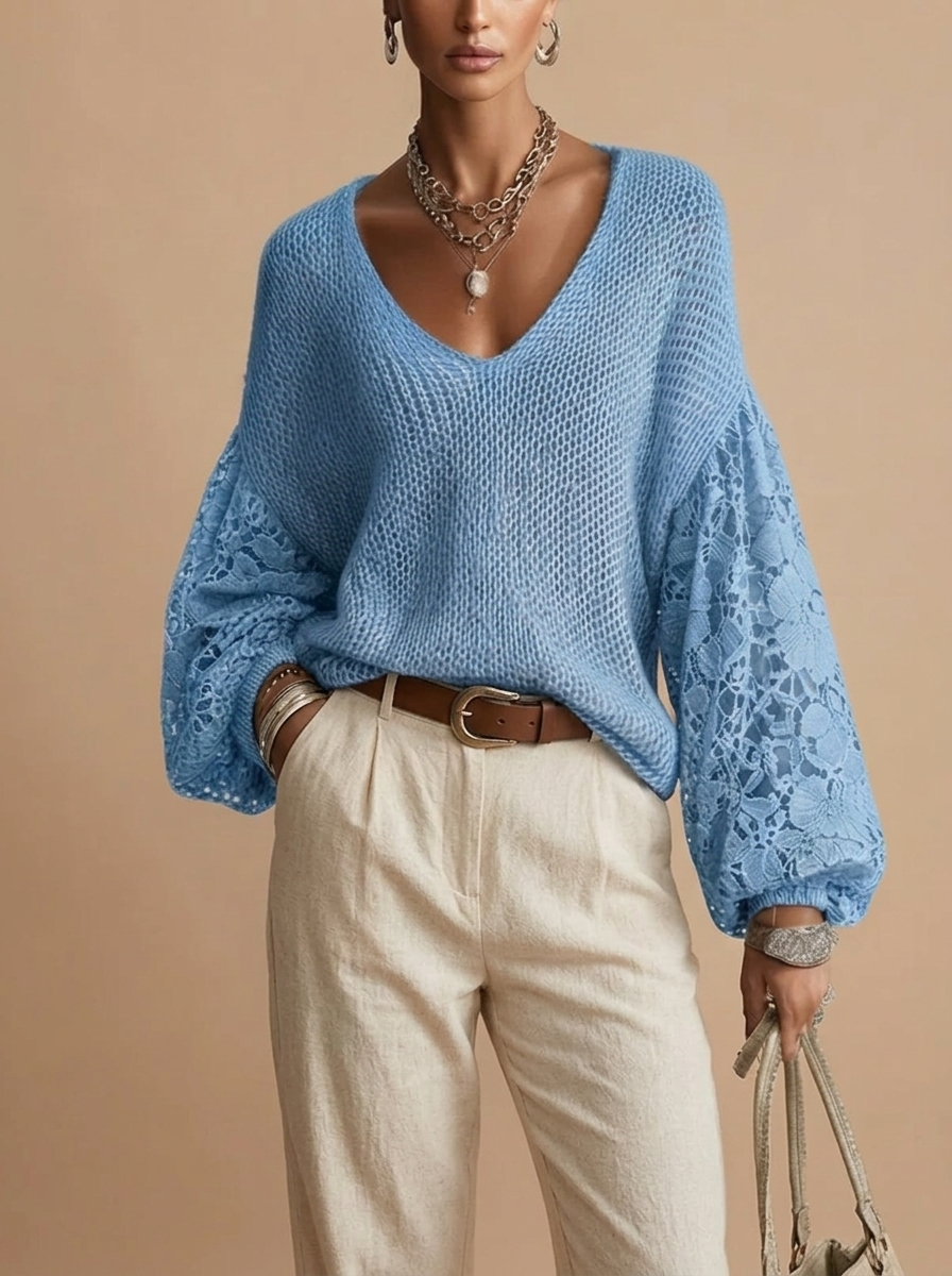 Front view of the Josefine Sweater Lace V-Neck Knit in Blue, featuring a delicate lace V-neckline, soft knit fabric, and long sleeves. Designed by Bella Hudson.