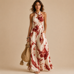 Juno Flowy Floral-Print Halter Maxi Dress in red featuring a halter neckline, flowing silhouette, artistic floral-inspired print, and elegant maxi-length design. Designed by Bella Hudson.