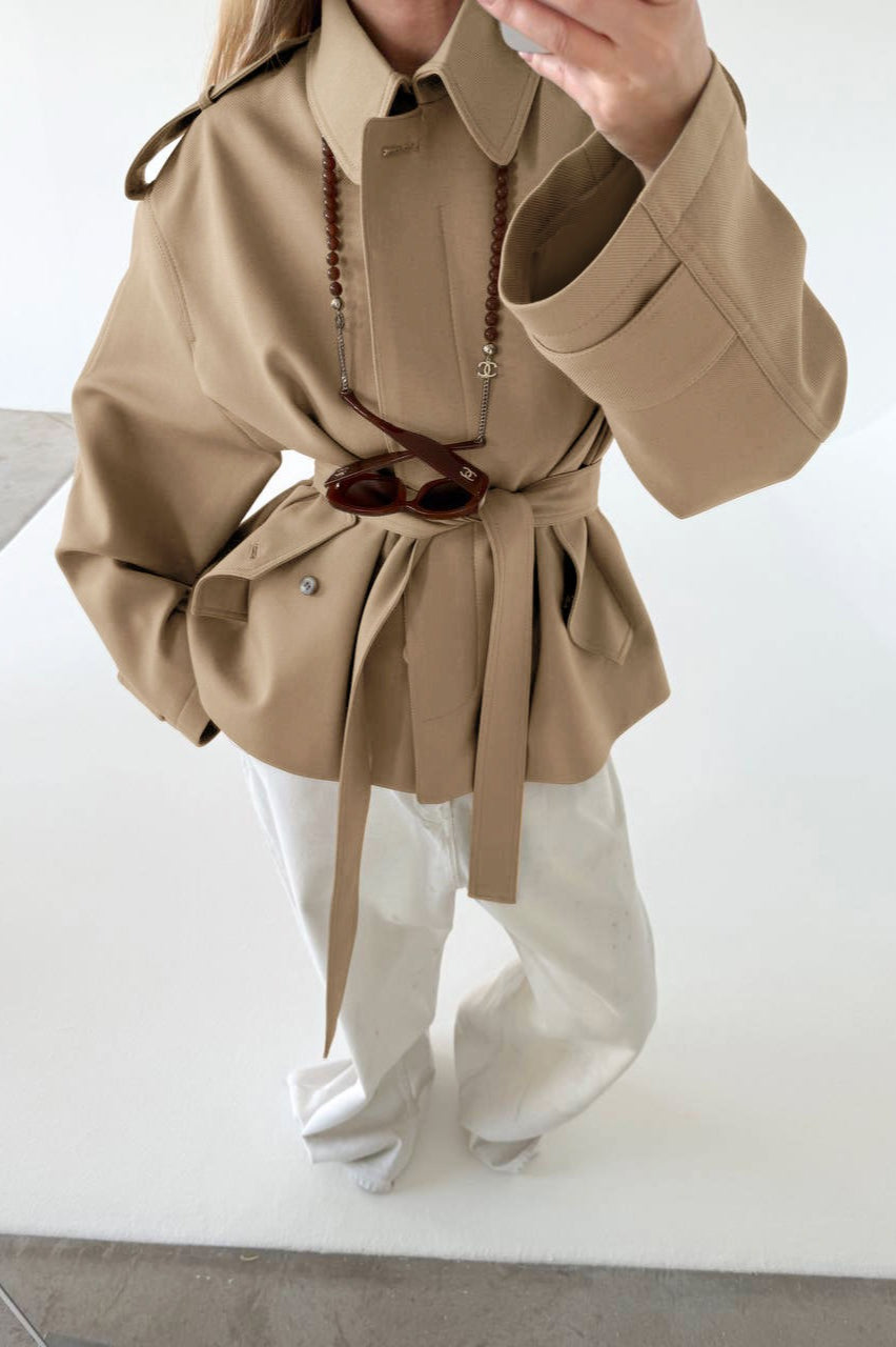 Lena Brown faux suede short jacket shown in a full-body view with a relaxed fit and self-tie belt