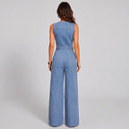 Back view of light blue denim jumpsuit with waist tie and wide leg pants by BELLA HUDSON
