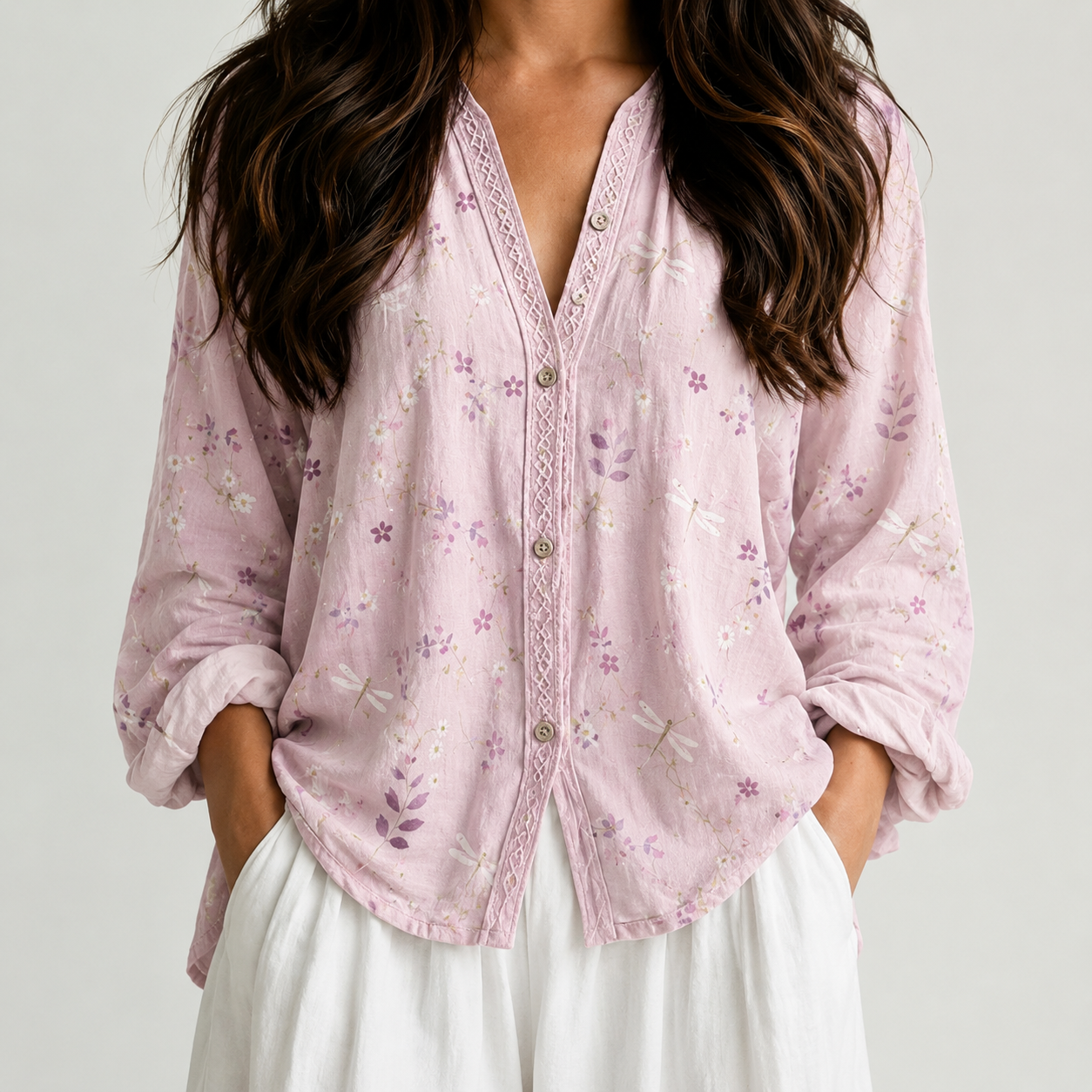 Light pink embroidered boho blouse with green trim front view BELLA HUDSON
