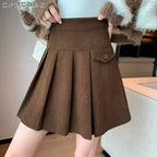 Lila Brown corduroy pleated mini skirt with high waist and flared silhouette