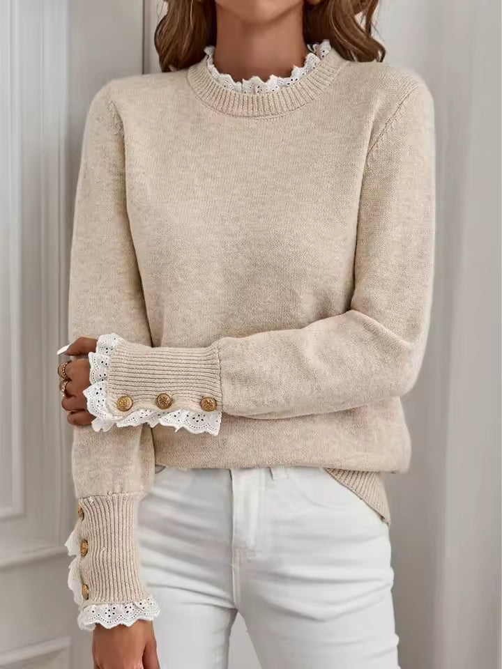 Lillian Beige knit sweater featuring a crew neckline with delicate lace trim, long sleeves, button-accented cuffs, and a relaxed silhouette