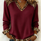 Lillian Red ribbed V-neck top featuring leopard-pattern trim, long sleeves, contrast cuffs, and an easy everyday fit