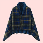 Linnea Blue plaid buttoned wrap shawl featuring a wide collar, button-front design, cape-style sleeves, and relaxed oversized silhouette
