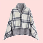 Linnea Gray plaid buttoned wrap shawl with a wide shawl collar, front button closure, cape-style sleeves, and oversized draped fit