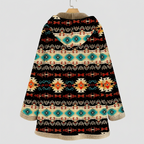 Mabel Beige patterned hooded coat shown from the back with an attached hood, geometric pattern, long sleeves, and relaxed silhouette