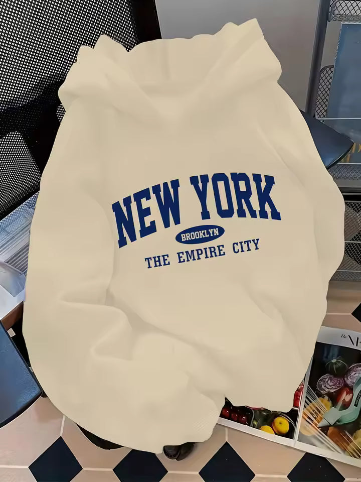 Madison Beige graphic hoodie featuring New York and Brooklyn lettering, hooded neckline, and ribbed cuffs