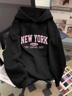 Madison Black graphic hoodie featuring New York lettering, kangaroo pocket, and ribbed hem