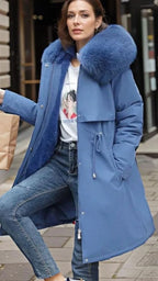 Madison Beige hooded parka featuring a plush faux-fur collar, adjustable waist belt, long sleeves, and front pockets