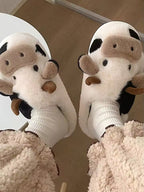 Maisie Brown cow plush slippers with closed-toe design and dimensional animal details