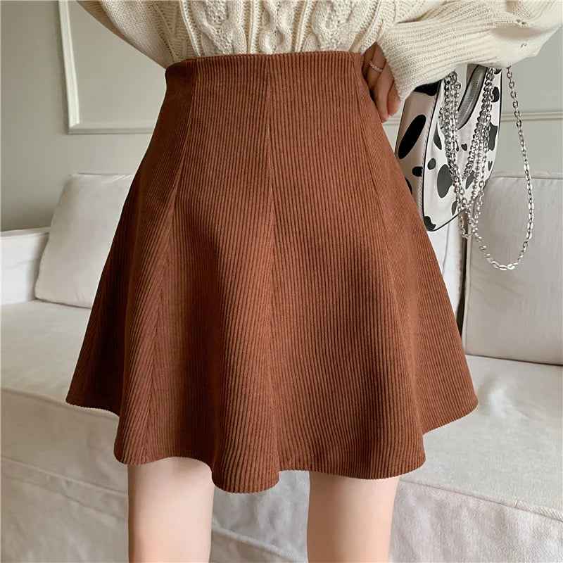 Mara Brown corduroy mini skirt with high waist and flared A-line silhouette