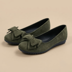 Marceline Ballet Flats Faux Suede Bow-Detail in Dark Green shown in side view, highlighting the soft faux suede finish, feminine bow accent, comfortable flat sole, and timeless ballet silhouette, designed by Bella Hudson.