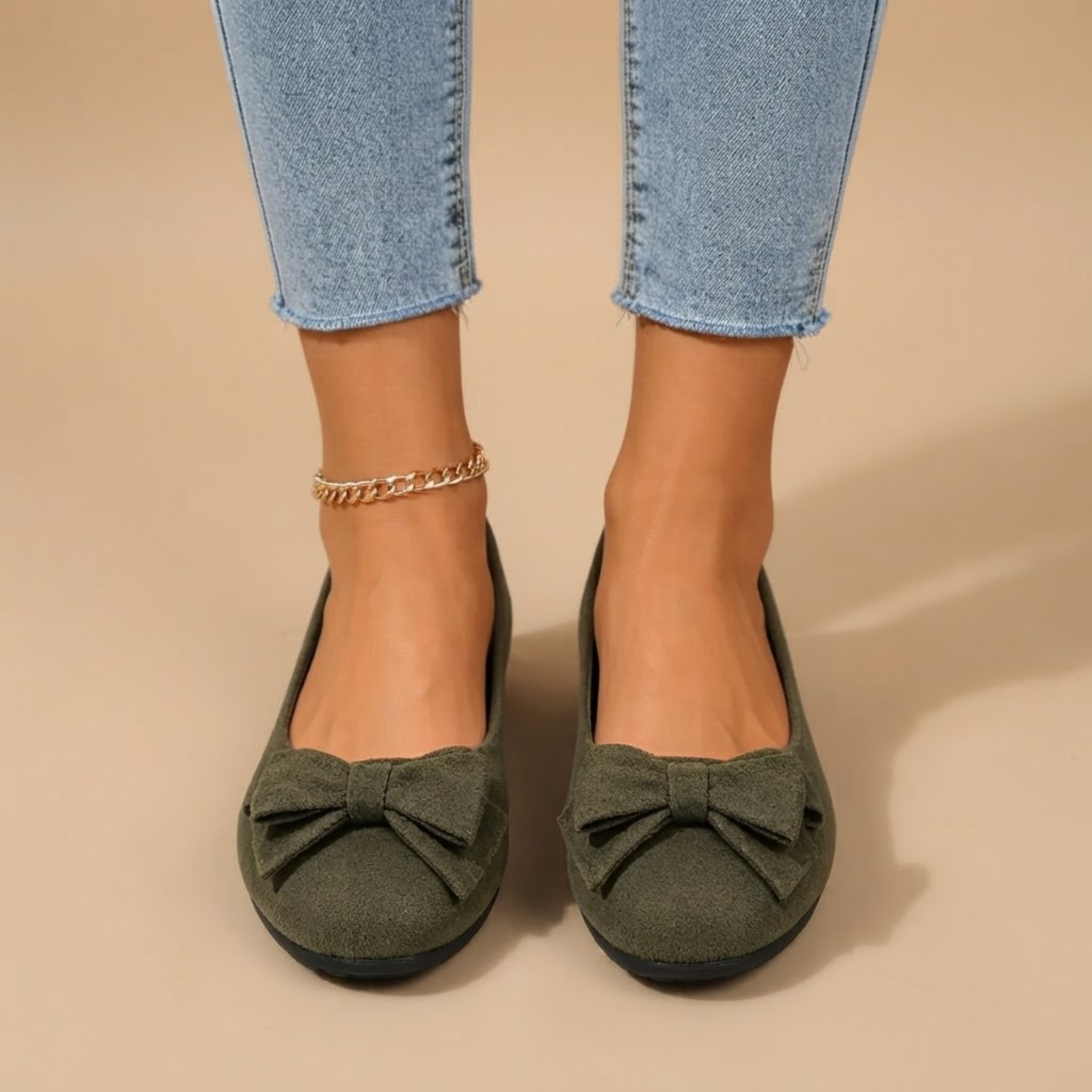 Marceline Ballet Flats Faux Suede Bow-Detail in Dark Green shown in top view, featuring a delicate bow detail, round toe, cushioned footbed, and soft faux suede construction, designed by Bella Hudson.
