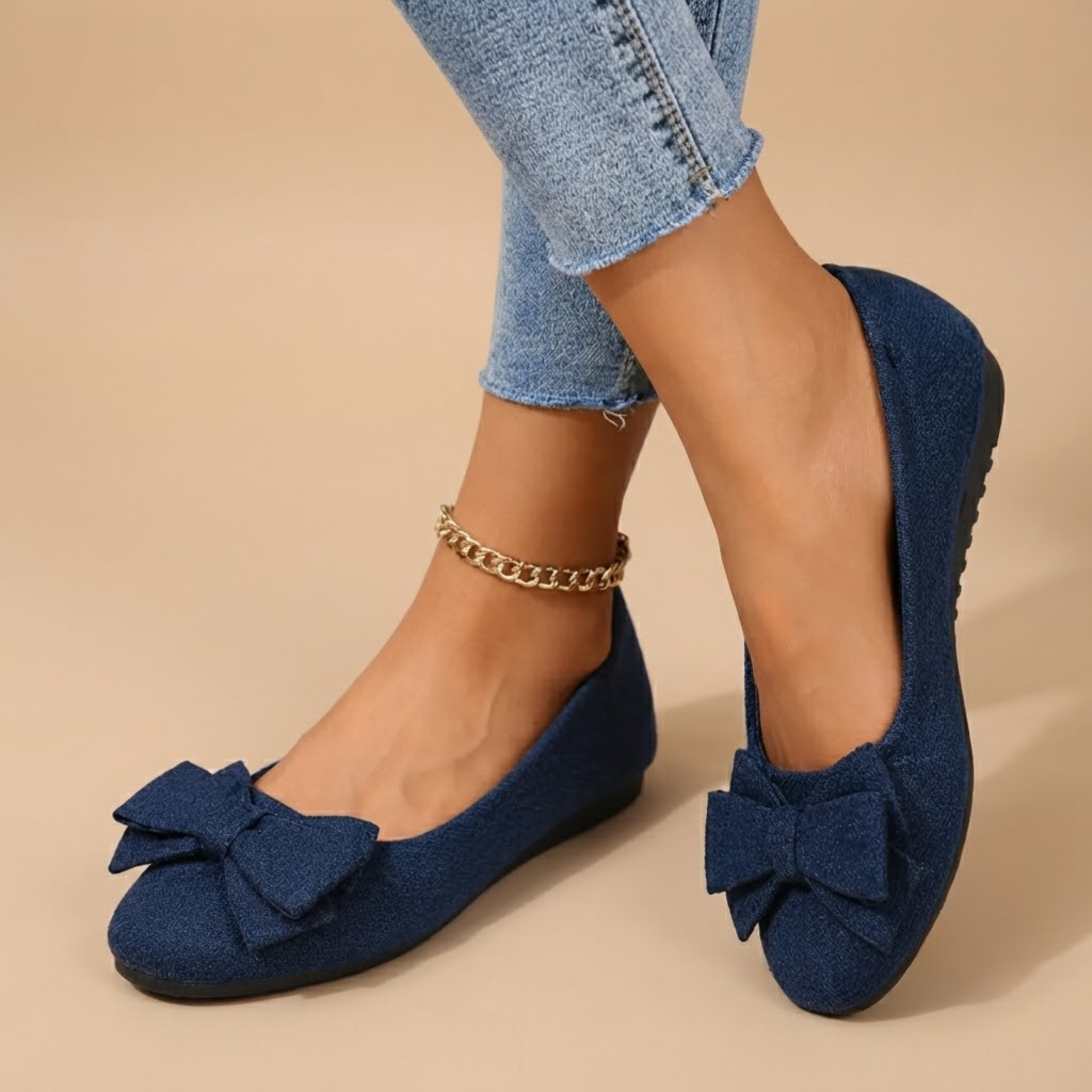 Marceline Ballet Flats Faux Suede Bow-Detail in Navy Blue shown in front view, featuring a soft faux suede upper, elegant bow detail, classic round toe, cushioned insole, and timeless ballet flat silhouette, designed by Bella Hudson.