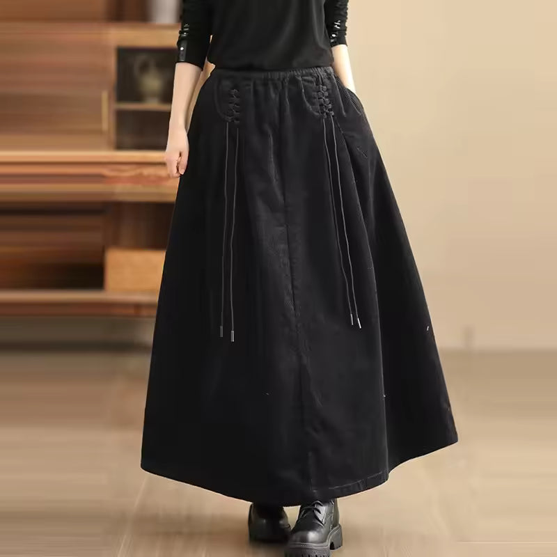 Maren Black corduroy maxi skirt with relaxed high-waist A-line shape