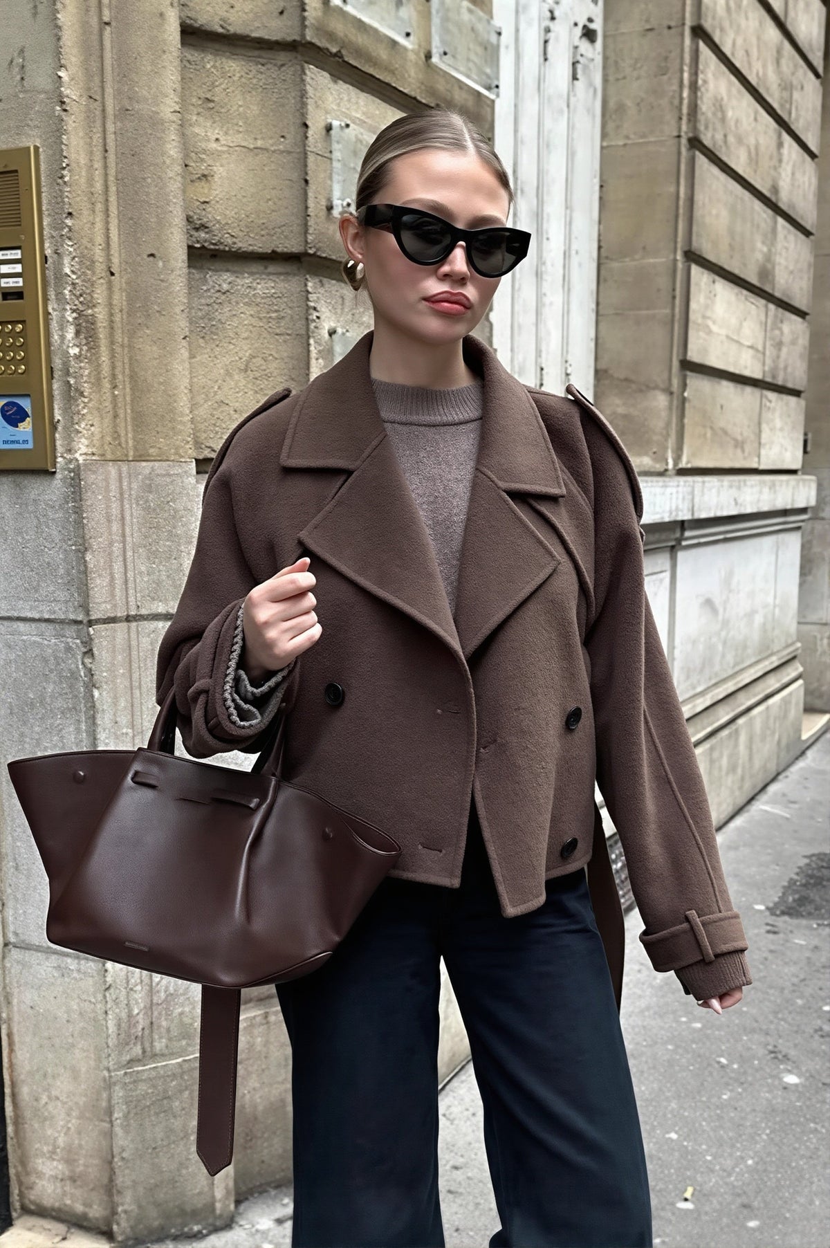 Maren Dark Brown cropped jacket shown from the front with wide notched lapels and a double-breasted button closure.