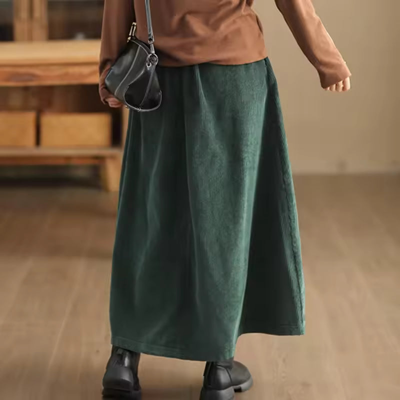 Maren Green corduroy maxi skirt with high waist and relaxed A-line shape