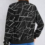 Back view of the Marisol Jacket Bomber Geometric-Print in black, featuring the all-over white geometric line print, long sleeves, and classic bomber silhouette. Designed by Bella Hudson.