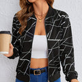 Front view of the Marisol Jacket Bomber Geometric-Print in black, featuring an all-over white geometric line print, zip-front closure, long sleeves, and a classic bomber silhouette. Designed by Bella Hudson.