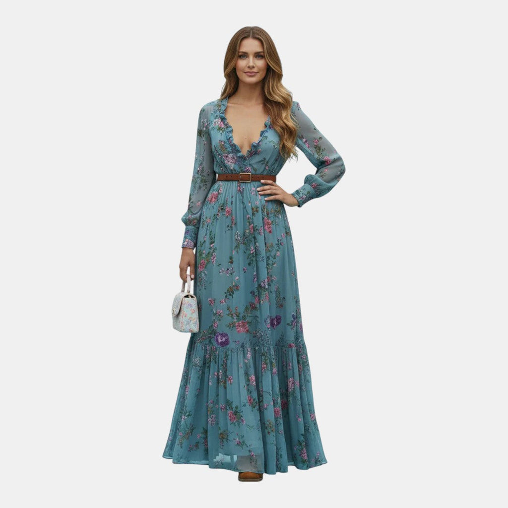 Front view of the Marlena Maxi Dress Floral-Embroidered Long-Sleeve Boho in blue, featuring a deep V-neckline, long sleeves, embroidered floral details, braided waist belt, and flowing maxi silhouette. Designed by Bella Hudson.
