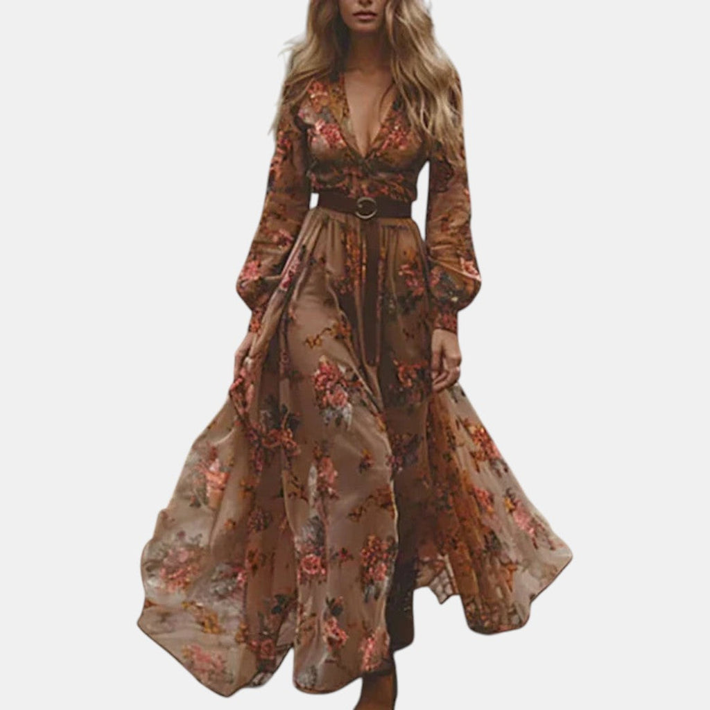 Front view of the Marlena Maxi Dress Floral-Embroidered Long-Sleeve Boho in dark brown, featuring a deep V-neckline, long sleeves, embroidered floral details, braided waist belt, and a flowing maxi silhouette. Designed by Bella Hudson.