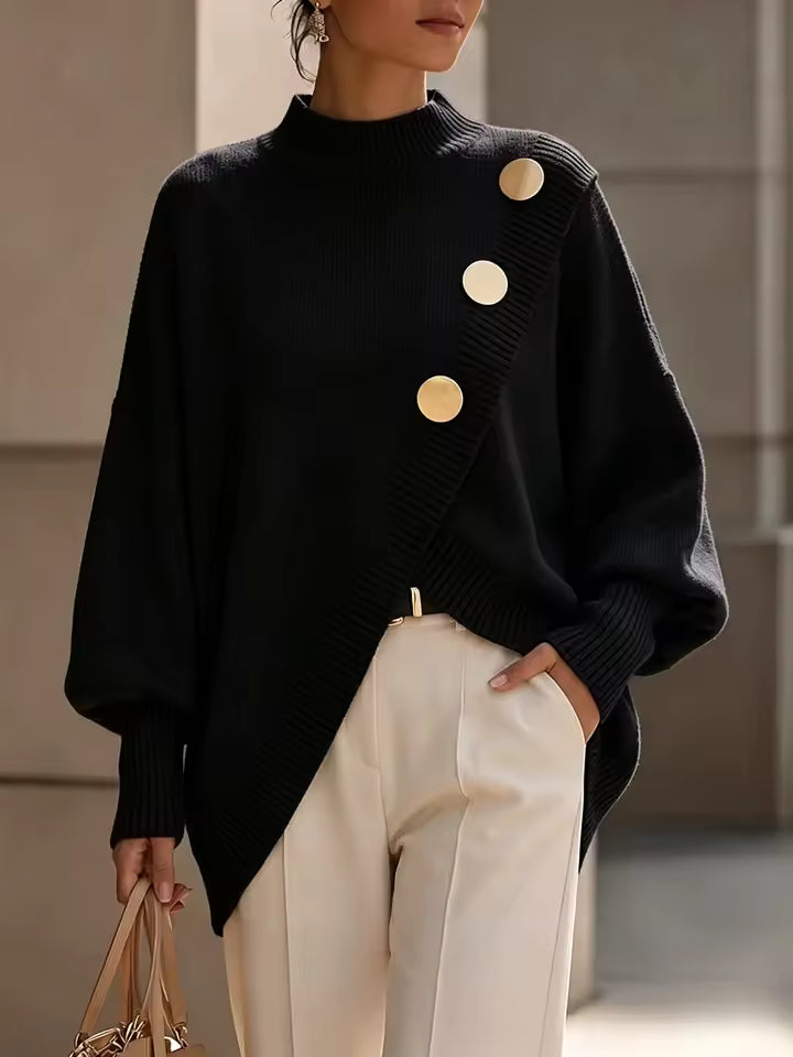 Maya Black mock-neck sweater with diagonal button detailing, relaxed fit, and asymmetric overlapping front