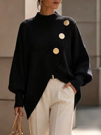 Maya Black mock-neck sweater with diagonal button detailing, relaxed fit, and asymmetric overlapping front