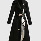 Maya Black midi trench coat with wide lapels, buckle waist belt, patterned scarf detail, and elegant long-length silhouette