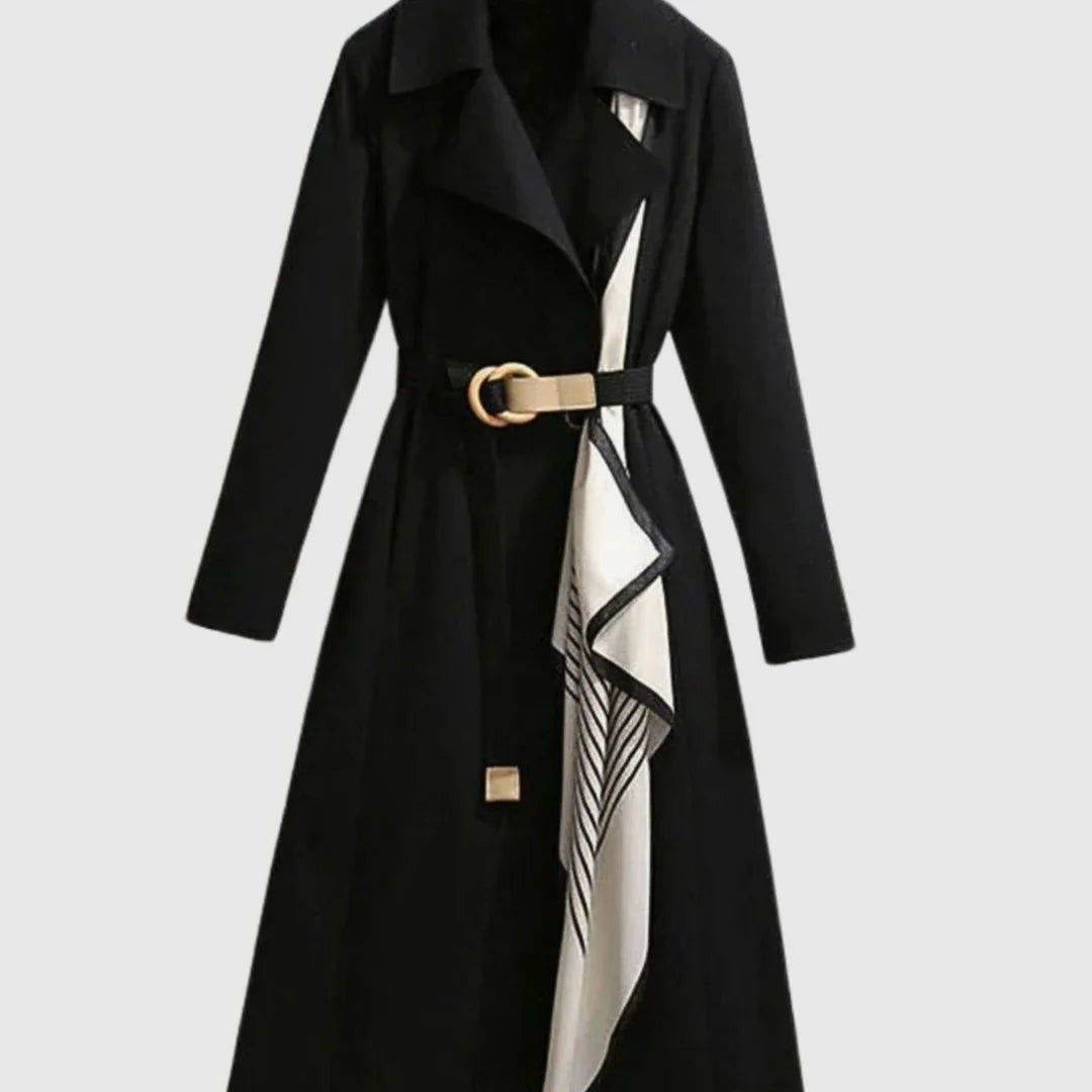 Maya Black midi trench coat with wide lapels, buckle waist belt, patterned scarf detail, and elegant long-length silhouette