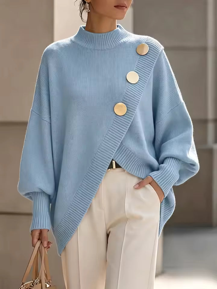 Maya Blue ribbed knit sweater with mock neck, decorative statement buttons, long sleeves, and asymmetric hem