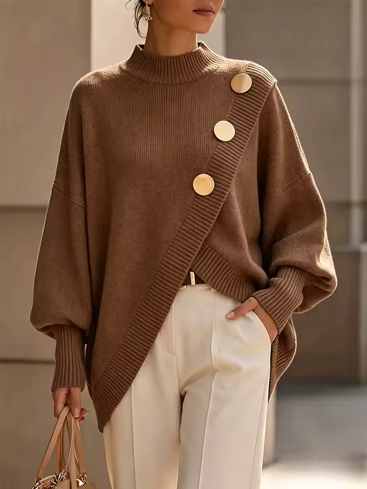 Maya Brown mock-neck sweater with decorative buttons, ribbed knit texture, and relaxed silhouette