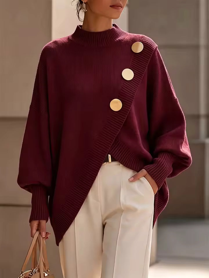 Maya Burgundy ribbed knit sweater with diagonal button accents, mock neckline, and asymmetric front