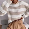Meredith Beige relaxed striped knit sweater with a crew neckline, dropped shoulders, long sleeves, and ribbed trim