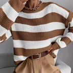 Meredith Brown relaxed striped knit sweater featuring a crewneck, horizontal stripes, dropped shoulders, long sleeves, and ribbed trim