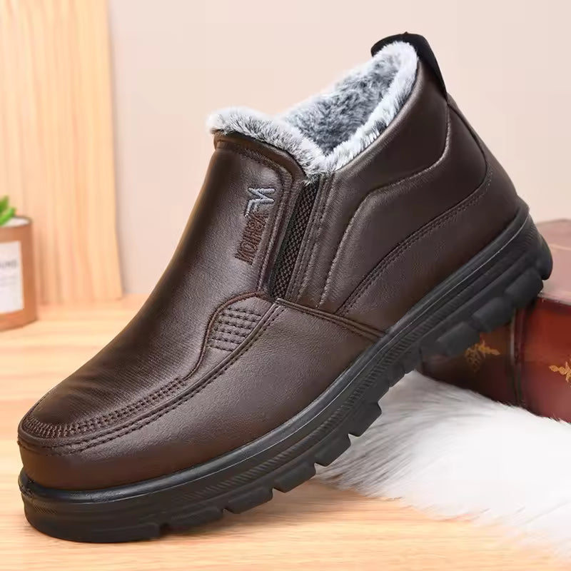 Mia Brown slip-on ankle boots with plush lining and elastic side panels, shown on feet